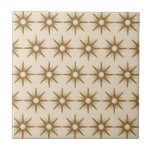 Gold Starburst-patroon uit de middeleeuwen Tegeltje<br><div class="desc">Het moderne, geïnspireerde ontwerp uit de midden-eeuw, met een patroon van retro goudsterrenburen op een beige achtergrond. Eenvoudig, schoon modern design. Creëer uw eigen douanepatroon door een nieuw afbeelding te uploaden, of gebruik de "contact deze ontwerper"knoop voor hulp. Om uw eigen gepatenteerde ontwerp te creëer: 1. Selecteer personaliseren deze sjabloon....</div>