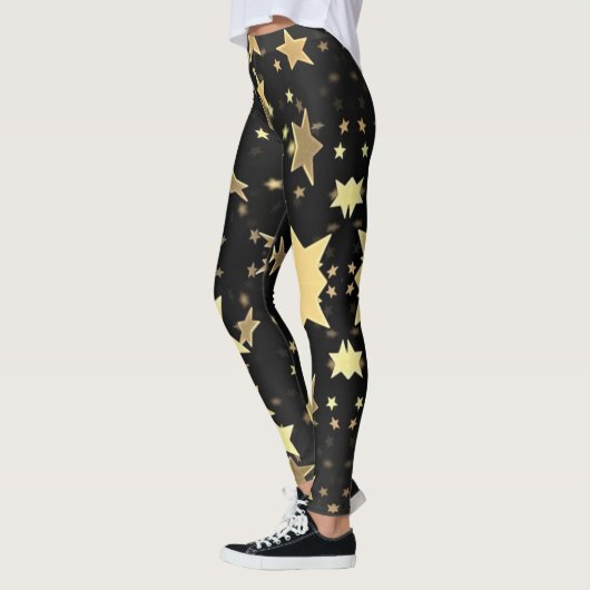 Gold Stars op zwarte achtergrond Leggings (Links)