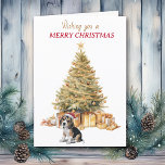 Gold Tree Beagle Puppy Kerst Kaart<br><div class="desc">Op de voorzijde van deze kerstkaart draagt een schattige Beagle-puppy een rood-witte kerstmuts en zit hij voor een kerstboom. De boom is gedecoreerd in goud, en bijpassende geschenkpakketten liggen eronder. In de rode en gouden tekst staat: "Ik wens u een vrolijk kerstfeest". In tekstvelden die u kunt aanpassen aan alles...</div>