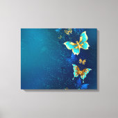 Golden Butterflies op een blauwe achtergrond Canvas Afdruk (Voorkant)