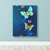 Golden Butterflies op een blauwe achtergrond Canvas Afdruk (Insitu (Houten vloer))
