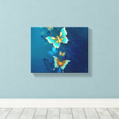 Golden Butterflies op een blauwe achtergrond Canvas Afdruk (Insitu (Houten vloer))