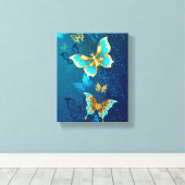 Golden Butterflies op een blauwe achtergrond Canvas Afdruk (Insitu (Houten vloer))
