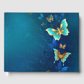 Golden Butterflies op een blauwe achtergrond Gastenboek (Voorkant)
