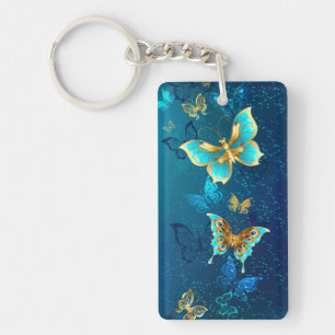 Golden Butterflies op een blauwe achtergrond Sleutelhanger