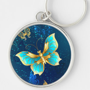Golden Butterflies op een blauwe achtergrond Sleutelhanger