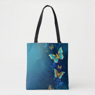 Golden Butterflies op een blauwe achtergrond Tote Bag