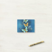 Golden butterflies post-it® notes (Op bureau)