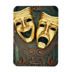 Golden comedy en tragedie maskers op gevlekt magneet