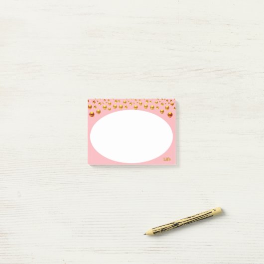 Golden Confetti op roze Post-it® Notes (Op bureau)