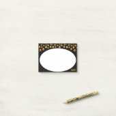 Golden Confetti op zwart en wit Post_It Notes (Op bureau)