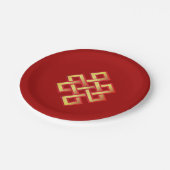 Golden eindeloze knoop op het rode kruis papieren bordje (Gekanteld)
