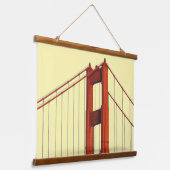 Golden Gate Bridge tegen gele achtergrond Hangend Wandkleed (Gebogen)