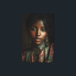 Golden Glow Melanin Regal Headscarf Portrait Canvas Afdruk<br><div class="desc">Golden light caresses rich brown skin, illuminating sharp cheekbones, glossy lips, and intense dark eyes beneath a luxurious emerald-magenta-gold paisley headscarf. Elaborate antique gold earrings with dangling gems frame her face, while the high-neck embroidered garment in jewel tones adds regal texture and depth. The intimate close-up against a moody dark...</div>