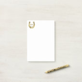 Golden hoefijzer post-it® notes (Op bureau)