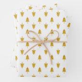 Golden kerstbomen op witte achtergrond inpakpapier vel (In situ)