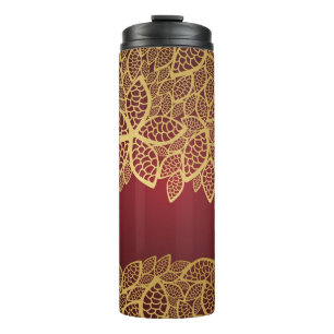 Golden leaf op rode achtergrond thermosbeker
