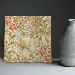 Golden Lily William Morris Arts Crafts Floral Tegeltje<br><div class="desc">William Morris Lily Pattern Design. William Morris was een Engelse textielontwerper, kunstenaar, schrijver en socialist die banden had met de Pre-Raphaelite Brotherhood en de British Arts and Crafts Movement. Hij richtte een ontwerpfirma op in samenwerking met de kunstenaar Edward Burne-Jones en de dichter en kunstenaar Dante Gabriel Rossetti. Dit mooie...</div>