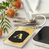 Golden metallic zwarte monogram sleutelhanger (Voorkant Rechts)
