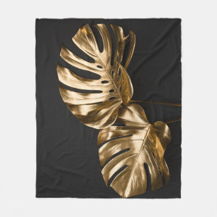 Golden Monstera: Luxe artistieke compositie Fleece Deken