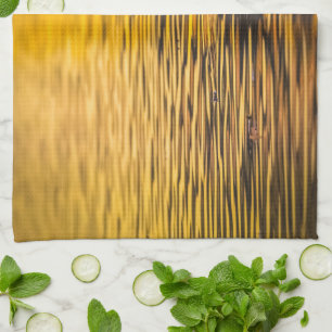 Golden oog op een gouden meer theedoek