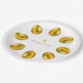 Golden paaseieren op wit papieren bordje (Gekanteld)