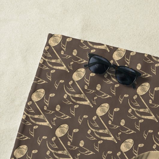 Golden Plectron – Stijlvol design voor muziekliefh Strandlaken (In situ)