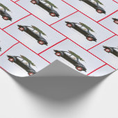 Golden rekwieg in oude auto met kerstboom cadeaupapier (Hoek)