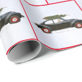 Golden rekwieg in oude auto met kerstboom cadeaupapier (Rol Hoek)