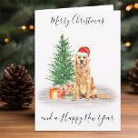 Golden Retriever Merry Kerstkersthond Feestdagen Kaart<br><div class="desc">Stuur kerstfeestdagen met een prettige kerstfeestkaart voor de kerstman van Merry... met een kerstcadeautje voor de kerstman... en een passend decor. Deze gouden reclametekaart is voorzien van een waterverf hond in een kersthoed en boom. Personaliseer met bericht en familienaam. Deze gouden kerstkaart voor het terugwinnen van kerstmis zal een favoriet...</div>