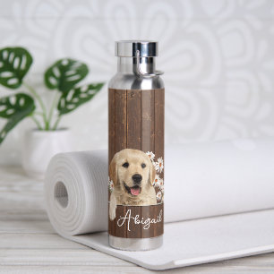 Golden Retriever op hout Waterfles
