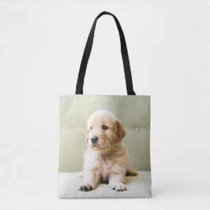 Golden Retriever Puppy op Couch Tote Bag