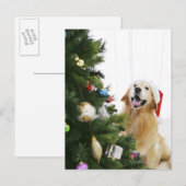 Golden retriever which watches Christmas tree Feestdagenkaart (Voorkant / Achterkant)