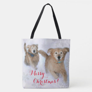 Golden Retrievers die door de sneeuwkerst springen Tote Bag