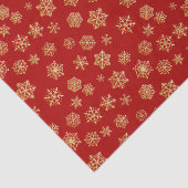 Golden sneeuwvlokken op een rode achtergrond tissuepapier (Detail)