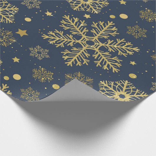 Golden sneeuwvlokken op marinepapier cadeaupapier (Hoek)