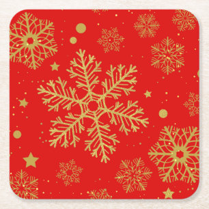Golden sneeuwvlokken op rood kartonnen onderzetters