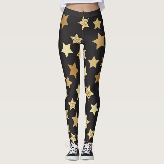 Golden sterren op zwart achtergrondpatroon leggings (Voorkant)