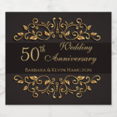 Golden zwemmen op het zwarte 50ste Jubileum van de Likeurfles Etiket (Enkel label)