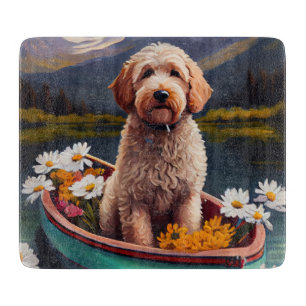 Goldendoodle op een peddel: een landschappelijk av snijplank
