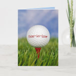 Golf Ball on T-shirt for Son-in-law's Birthday Car Kaart<br><div class="desc">Close-up van golfbal op rood t-shirt in groen gras voor de schoonzoon. Tekst op bal kan worden bewerkt.</div>