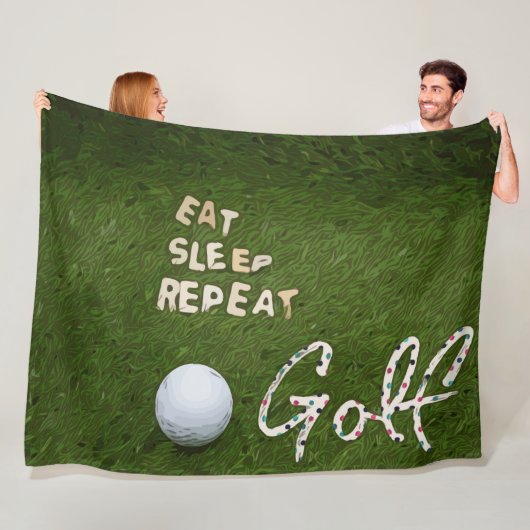 Golf eet slaap golf herhalen met golfbal op groen fleece deken (In situ)