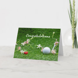 Golf gefeliciteerd met bloemen en golfbal kaart