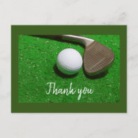 Golfbal en IJzer op groen