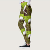 Golfbal en rotter op groen gras leggings (Links)