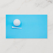 Golfbal en t-shirt op blauwe achtergrond visitekaartje (Voorkant)