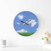 Golfbal in gras grote klok (Huis)