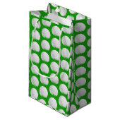 Golfbal in graspatroon klein cadeauzakje (Voorkant Gekanteld)