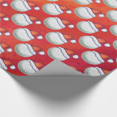 Golfbal in Santa Hat Pattern op Red Cadeaupapier (Hoek)