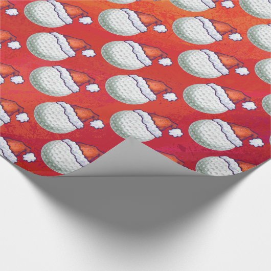 Golfbal in Santa Hat Pattern op Red Cadeaupapier (Hoek)